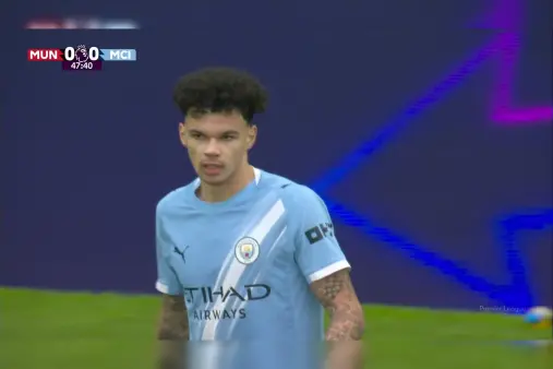 [Yellow Card] Distracted! O'Reilly dispossessed by Amad, pulls back opponent in desperation and gets booked