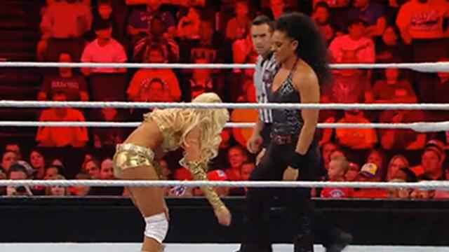 Raw: Kelly Kelly & Eve vs. Tamina & Rosa Mendes background
