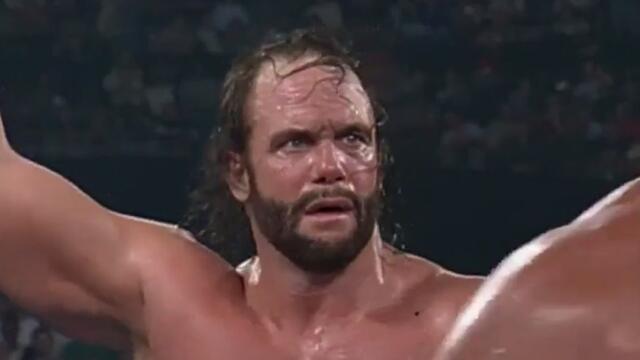 World War III 1995: "Macho Man" Randy Savage wins the WCW World Title in the first ever 60-Man Battle Royal backdrop