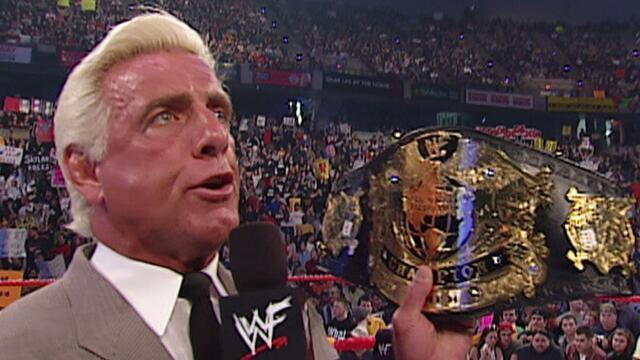 Ric Flair tries to give Triple H the new WWE Undisputed Championship Belt: Raw, April 1, 2002