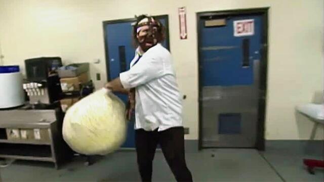 The Rock and Mankind use popcorn for something besides snacking: Halftime Heat, Jan. 31, 1999