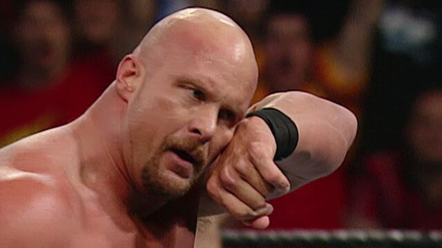 "Stone Cold" Steve Austin performs three Stunners on Eric Bischoff: No Way Out 2003 background