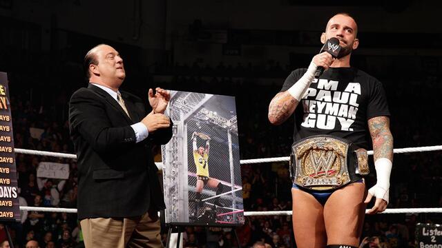 Ryback is put through a table after interrupting WWE Champion CM Punk's One-Year Anniversary Celebration: Raw, Nov. 19, 2012 background