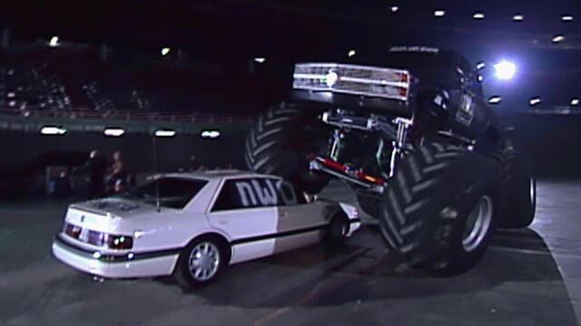 The nWo run over Sid with a monster truck: Nitro, Dec. 27, 1999 background