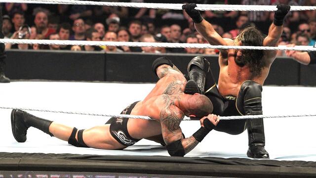 Randy Orton & Roman Reigns vs. Kane & Seth Rollins: Raw, April 27, 2015 background