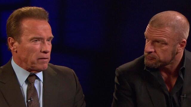 Triple H and Arnold Schwarzenegger discuss the significance of the International Sports Hall of Fame: March 8, 2015 backdrop