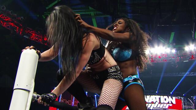 Nikki Bella powerbombs Paige and Naomi: WWE Elimination Chamber 2015 (WWE Network Exclusive)