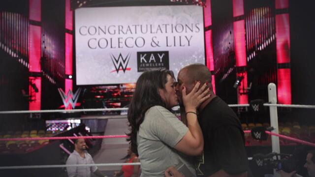 See a WWE fan get engaged in the ring!