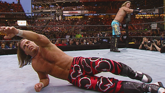 Chris Jericho delivers Sweet Chin Music to Shawn Michaels: WrestleMania XIX background