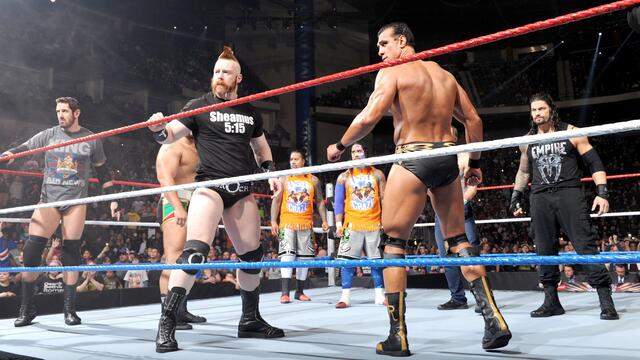 Roman Reigns, Dean Ambrose and The Usos kick off Tribute to the Troops: WWE Tribute to the Troops 2015 backdrop