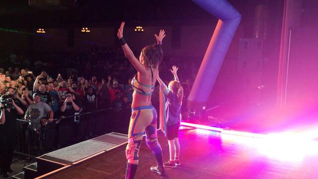 Bayley recreates her entrance with a huge fan
