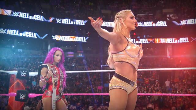 Raw Women's Champion Sasha Banks battles Charlotte Flair in a 30-Minute WWE Iron Man Match this Sunday at WWE Roadblock: End of the Line backdrop