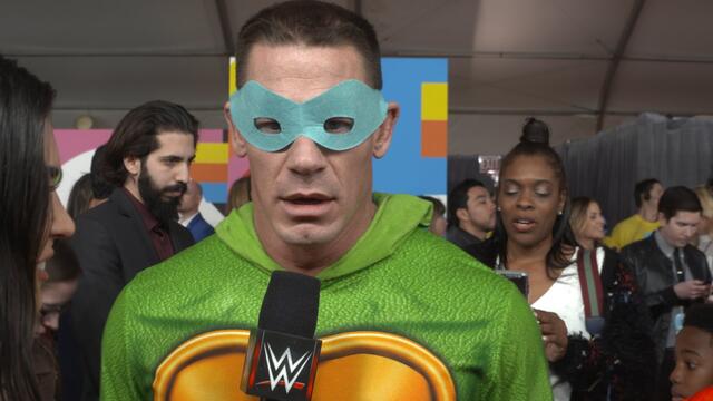 John Cena loves him some Leonardo on the orange carpet for Nickelodeon's 2018 Kids' Choice Awards backdrop