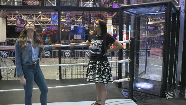 Stephanie McMahon enters the Elimination Chamber: WWE Now backdrop