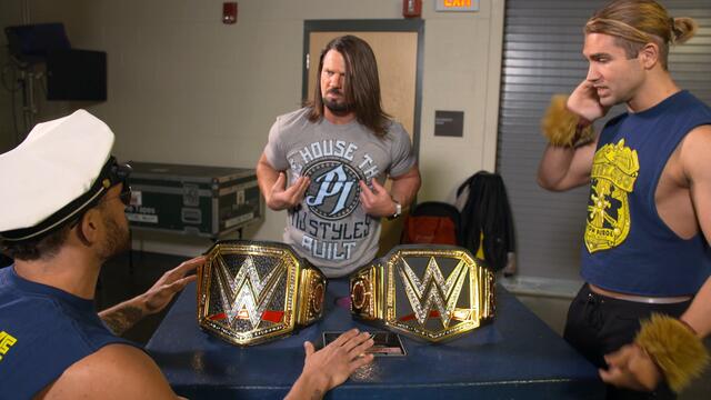 Breezango mixes up AJ Styles' WWE Championship with the new Elite Title from WWE Shop background