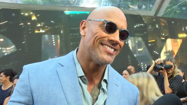 The Rock says he's teaching his daughter how to become a WWE Superstar background