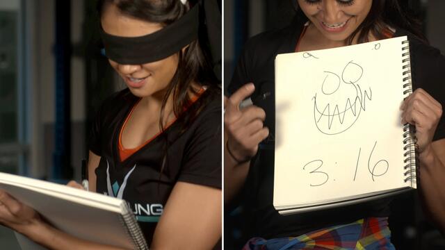 Blindfolded drawing challenge with Mae Young Classic competitors background