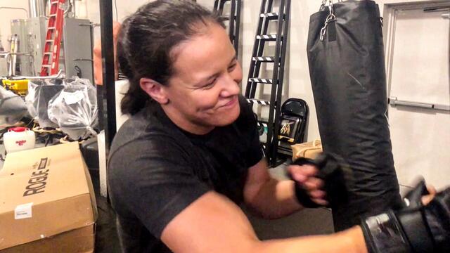 Rapid-fire questions with Shayna Baszler background