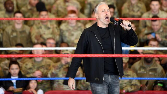 Special guest Jon Stewart laughs with the U.S. Armed Forces: WWE Tribute to the Troops, Dec. 20, 2018