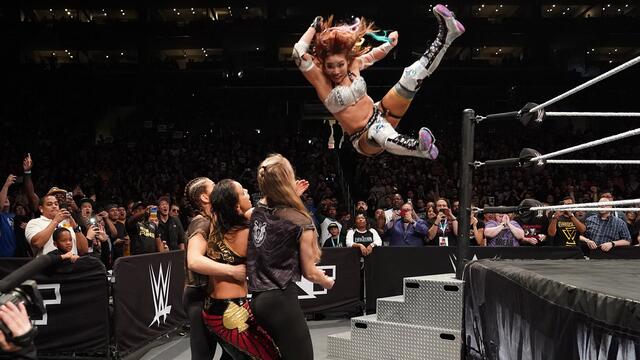 Kairi Sane takes out three Superstars with a jaw-dropping leap from the top rope: NXT Takeover: WarGames II (WWE Network Exclusive) background