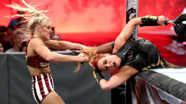 Brutal ring post attacks: WWE Top 10, July 8, 2019 background