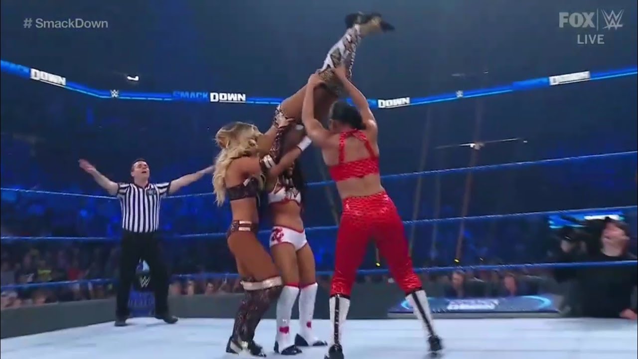 Bianca Belair & Sasha Banks V.S Carmella & Zelina Vega 1/2 background