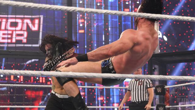 Drew McIntyre stops Jeff Hardy’s charge with Claymore: WWE Elimination Chamber (WWE Network Exclusive) background