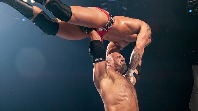Goldberg cleans house against Evolution: Raw, Dec. 1, 2003 background