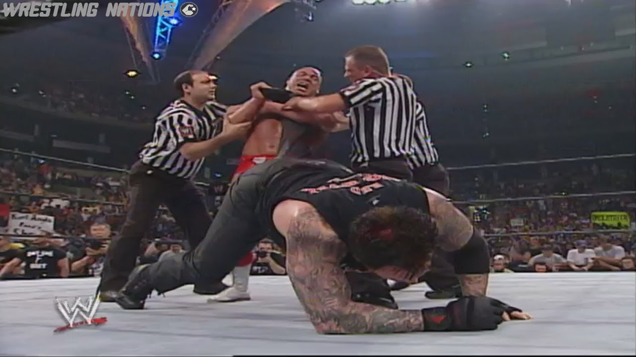 Undertaker vs Kurt Angle Match Ended in Drama background