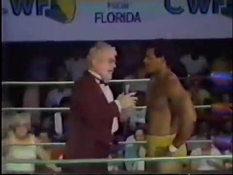 Bruiser Brody and Big John Stud Attacks Butch Reed. 1982 background