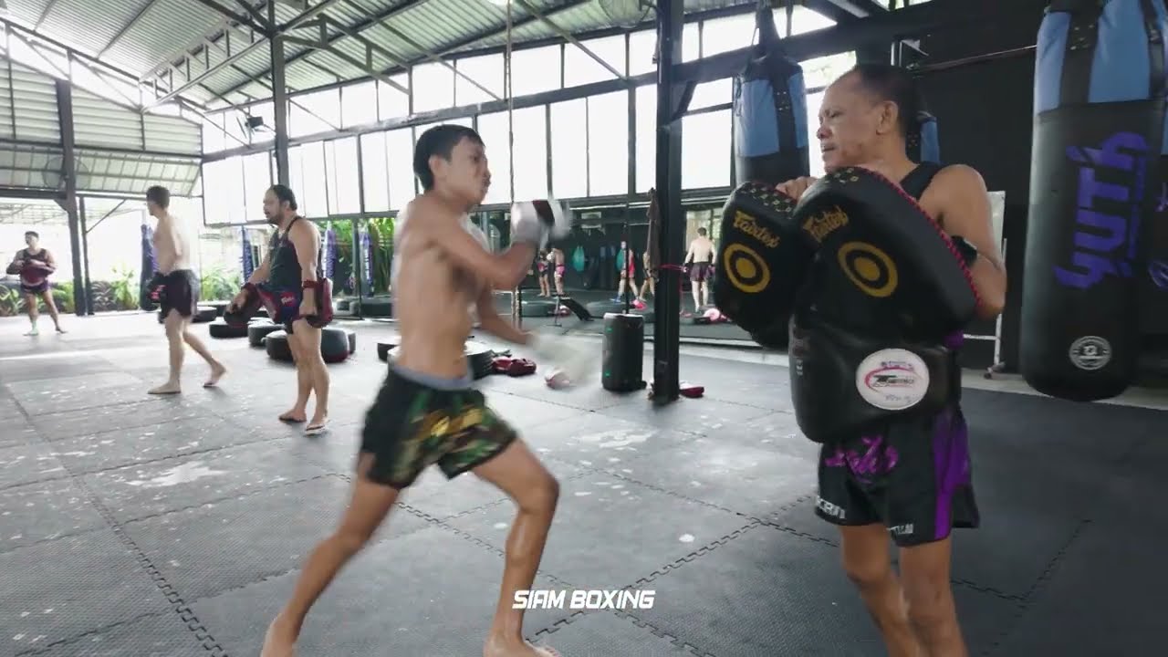 Raw Pad Work at Bangtao Muay Thai & MMA background