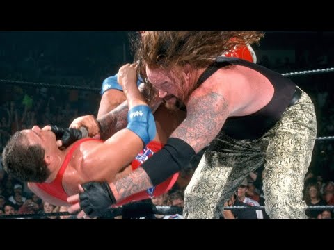 Story of Kurt Angle vs. The Undertaker | Survivor Series 2000 background