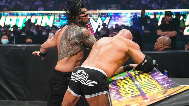 Goldberg shocks Roman Reigns with devastating Spear: WWE Elimination Chamber 2022 (WWE Network Exclusive) background