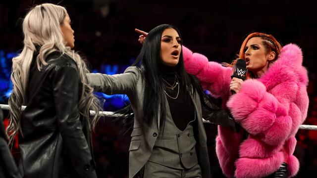 Becky Lynch and Liv Morgan agree to lead 10-Woman Tag Team Match during contract signing: Raw, Nov. 29, 2021 background