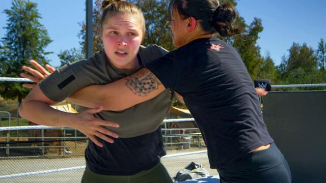 Ronda Rousey trains with Shayna Baszler in WrestleMania sparring session background