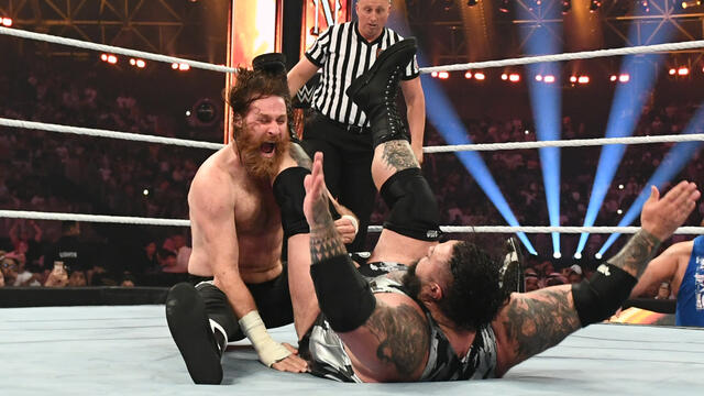 Sami Zayn, Chad Gable and Bronson Reed engage in a chaotic melee: King and Queen of the Ring 2024 highlights background