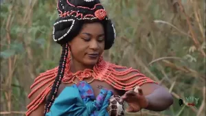 THE MAIDEN WITH THE ANCIENT BEAD