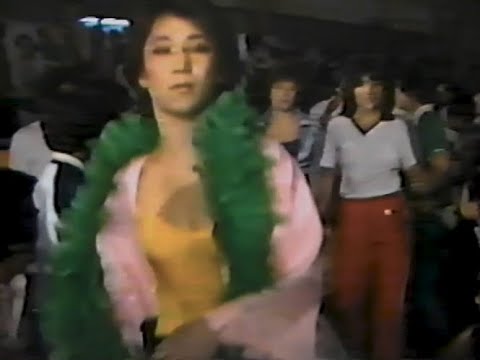 全日本女子プロレス ナンシー久美、ルーシー加山 vs マミ熊野、デビル雅美 WWWA世界タッグ選手権試合 1980年9月30日 埼玉・大宮スケートセンター background