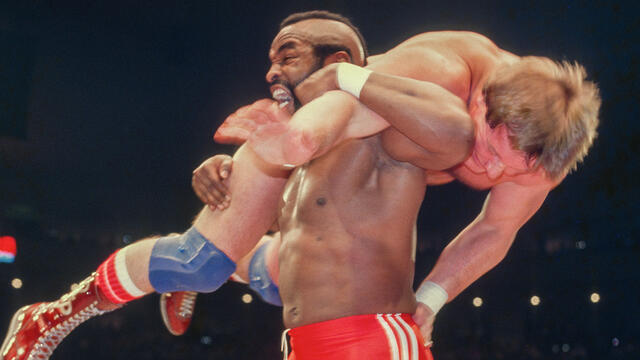 Mr. T and Roddy Piper trade vicious slaps to the face: A&E WWE Rivals Mr. T vs. Roddy Piper background