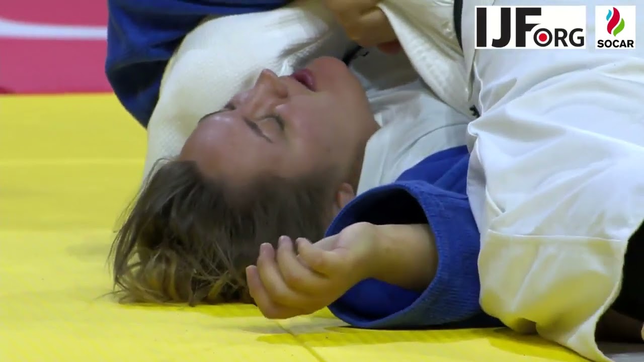 Dramatic Women's Judo Hold Pin Osaekomi background
