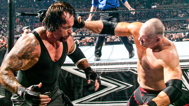Undertaker’s legendary rivalry with Kane reaches apex at WrestleMania: WWE Greatest Moments background