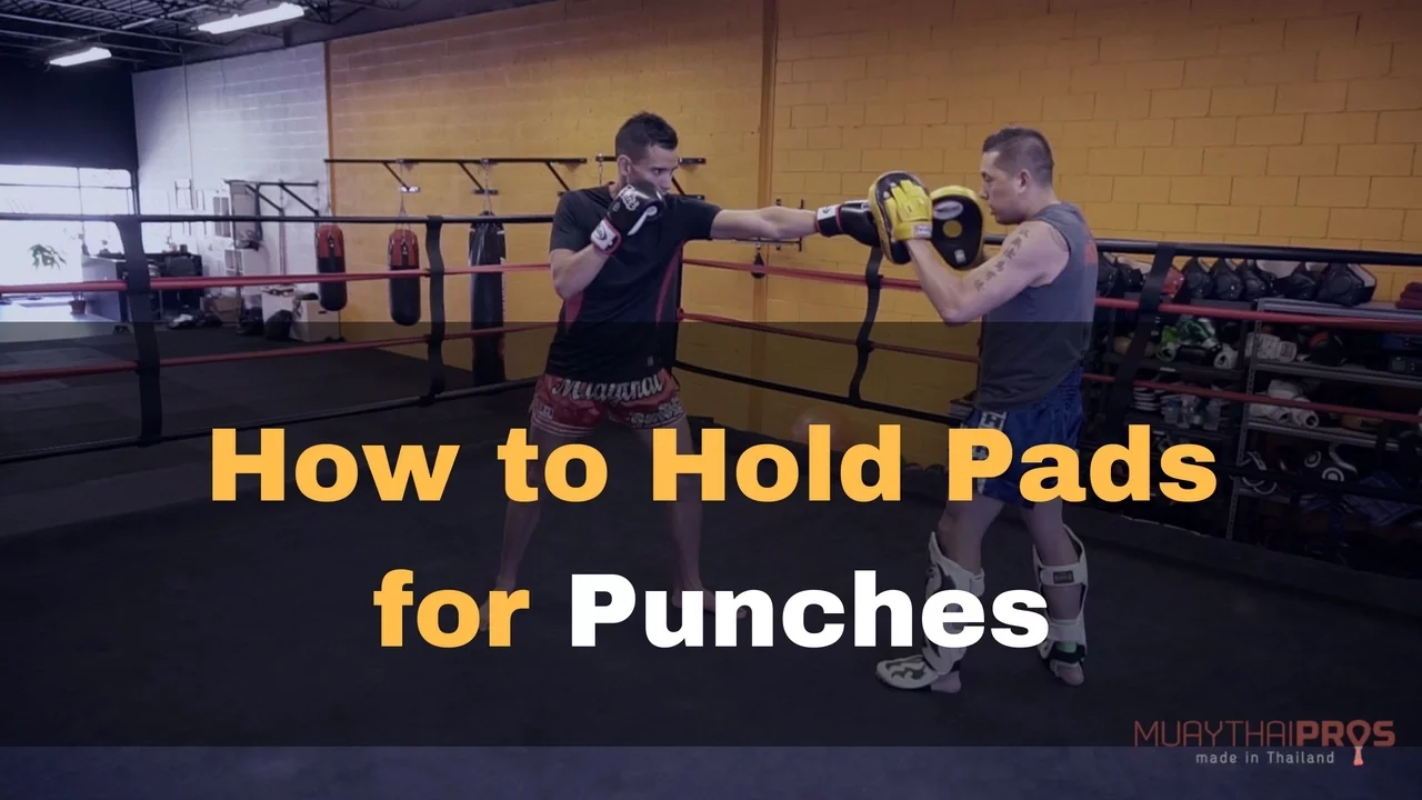 How to Hold Pads Boxing Mitts for Punches backdrop