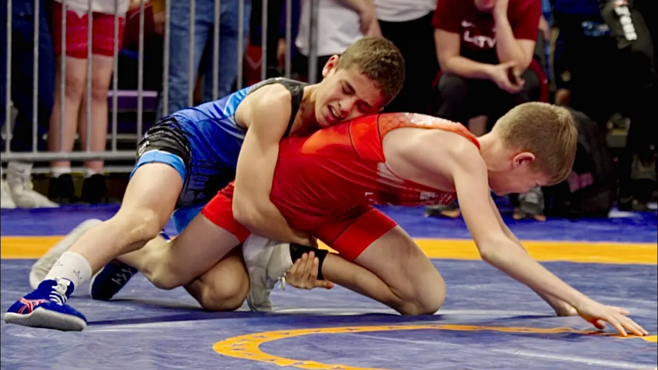 U15 Timurs Kujalovs (LAT) vs Tamir Shirmamedov (ISR) 44kg. Freestyle boys wrestling . B-cam-man background