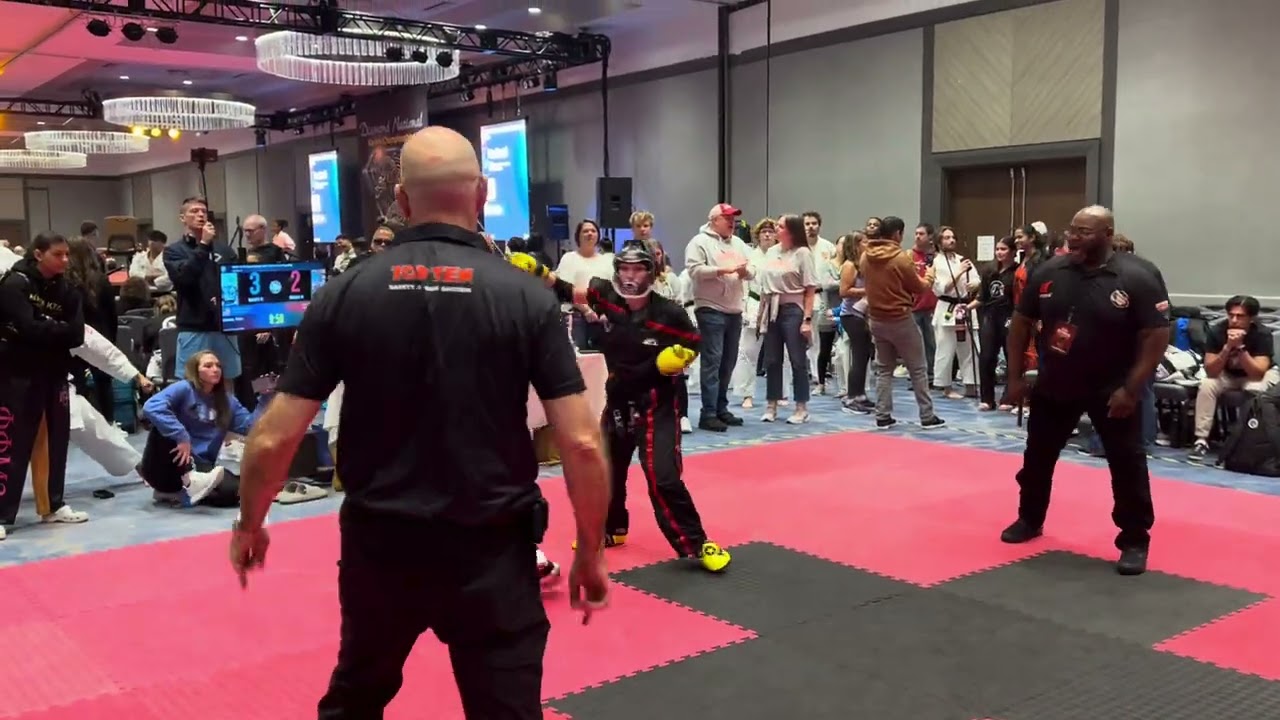 Emma Floyd vs Nora Hanson 14-15 Girls Sparring Grand Championship - Diamond Nationals 2025 background