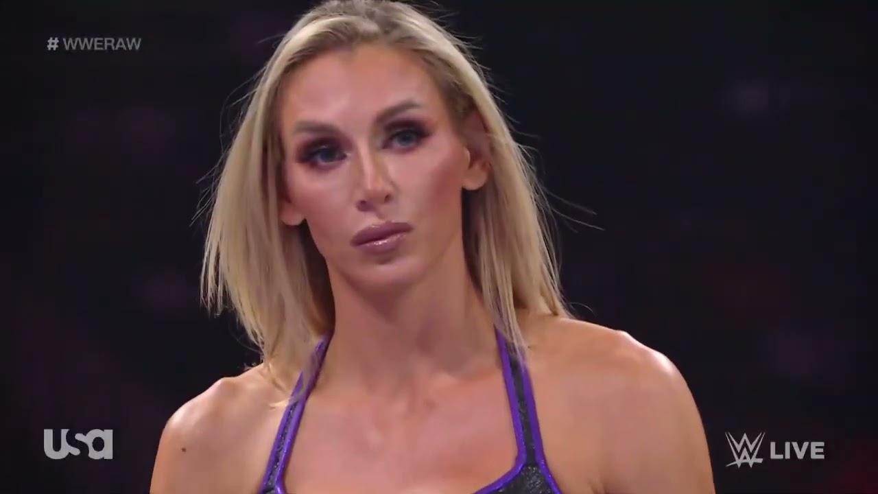 Nikki ASH vs. Charlotte Flair 1/2 background