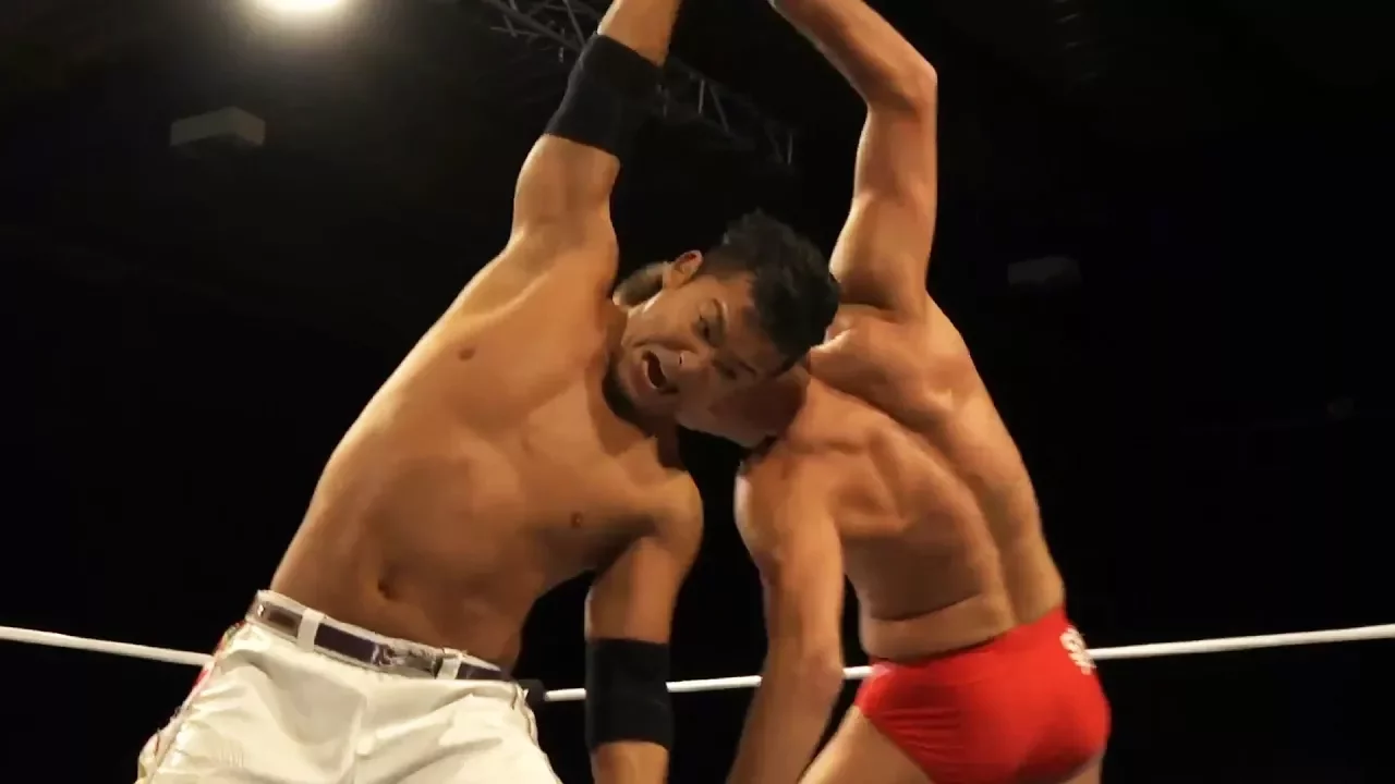 Zack Sabre Jr vs. KUSHIDA (Pro Wrestling World Cup - Quarter Finals) background