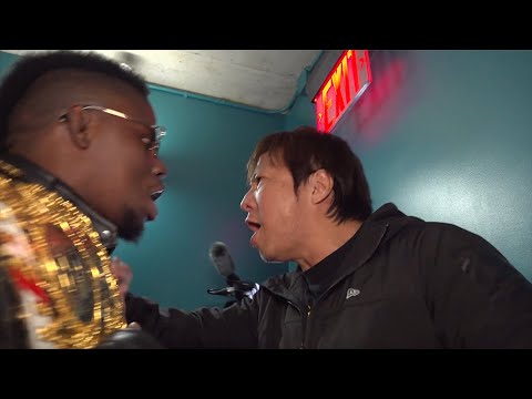 Kane crashes Satoshi Kojima media scrum background