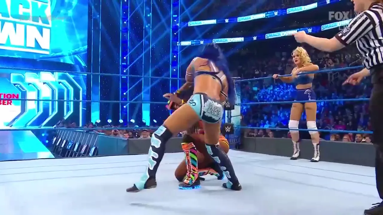 Sasha Banks & Bayley. Vs. Lacey Evans & Naomi Part 2 background