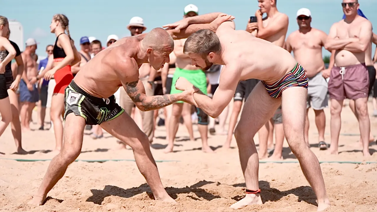 Rainer Viilveer (EST) vs Marek Saar (EST) 70kg. Men beach wrestling tournament.