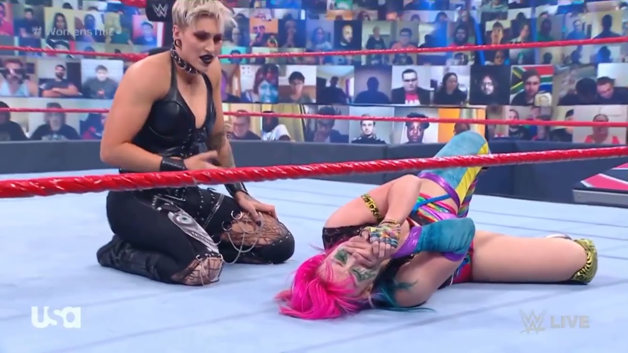 Asuka vs Rhea Ripely 2/2 Charlotte Flair Attacks background